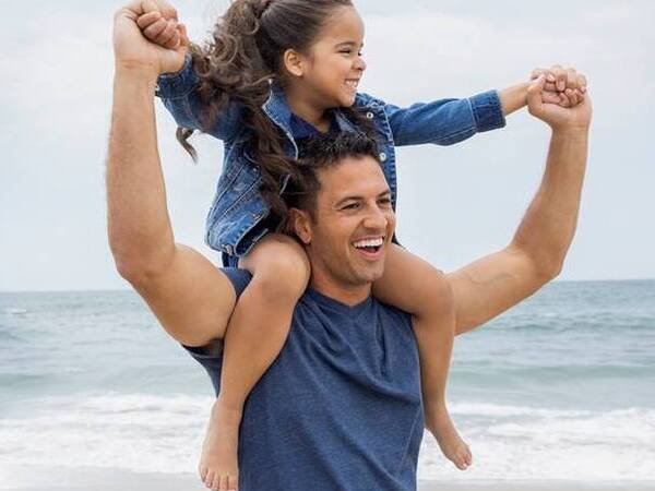 Happy and healthy dad, represents a patient who takes advantage of the diagnostic and treatment options available at Scripps to treat common men’s health issues.